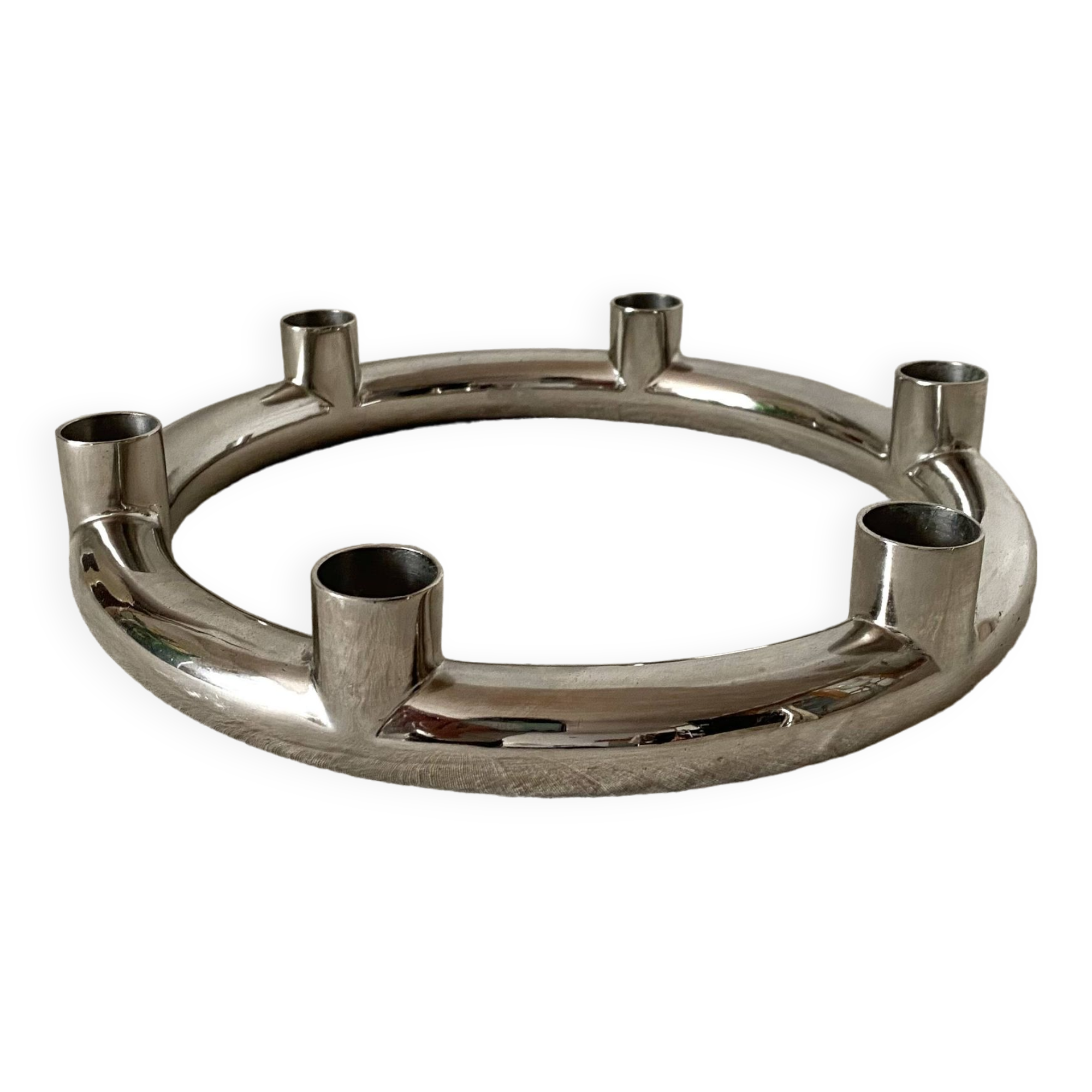 Tubular chrome candle holder