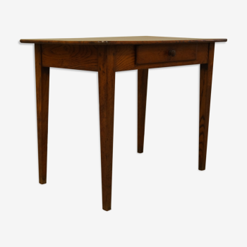Old desk in chestnut side table