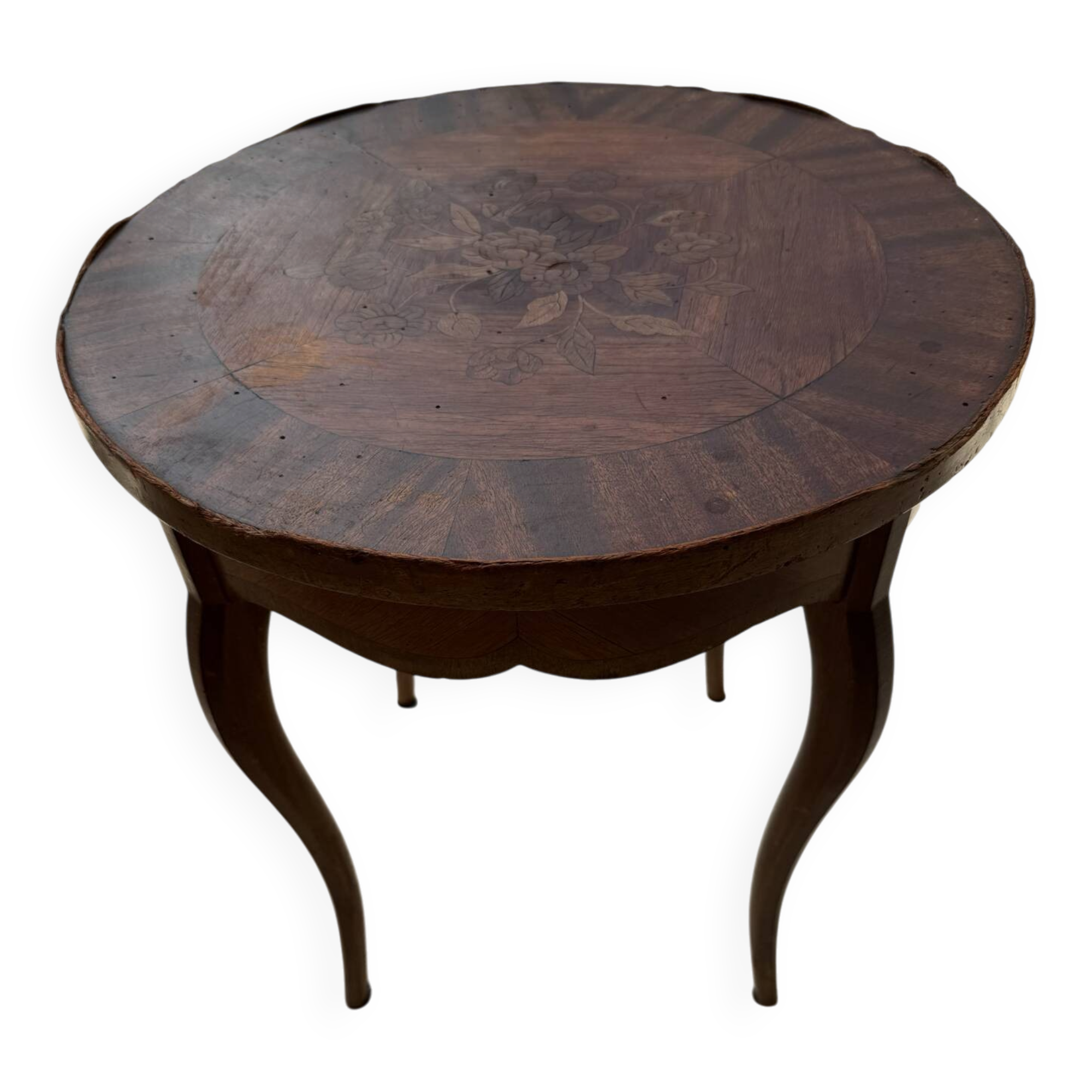 Round guéridon from the Louis-Philippe period, made of walnut and inlaid.