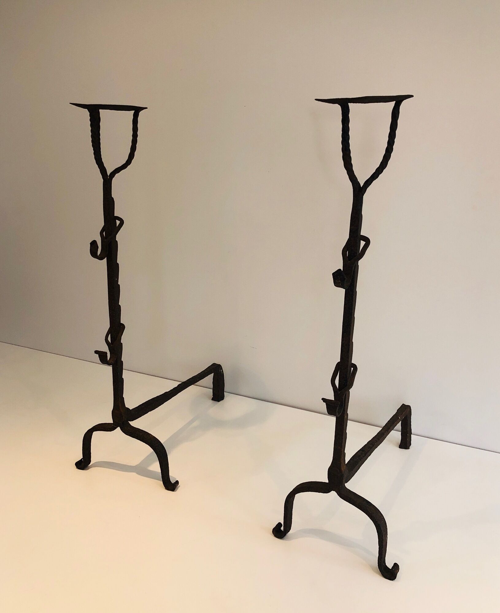 Pair of wrought iron landiers. french work ,seventeenth century