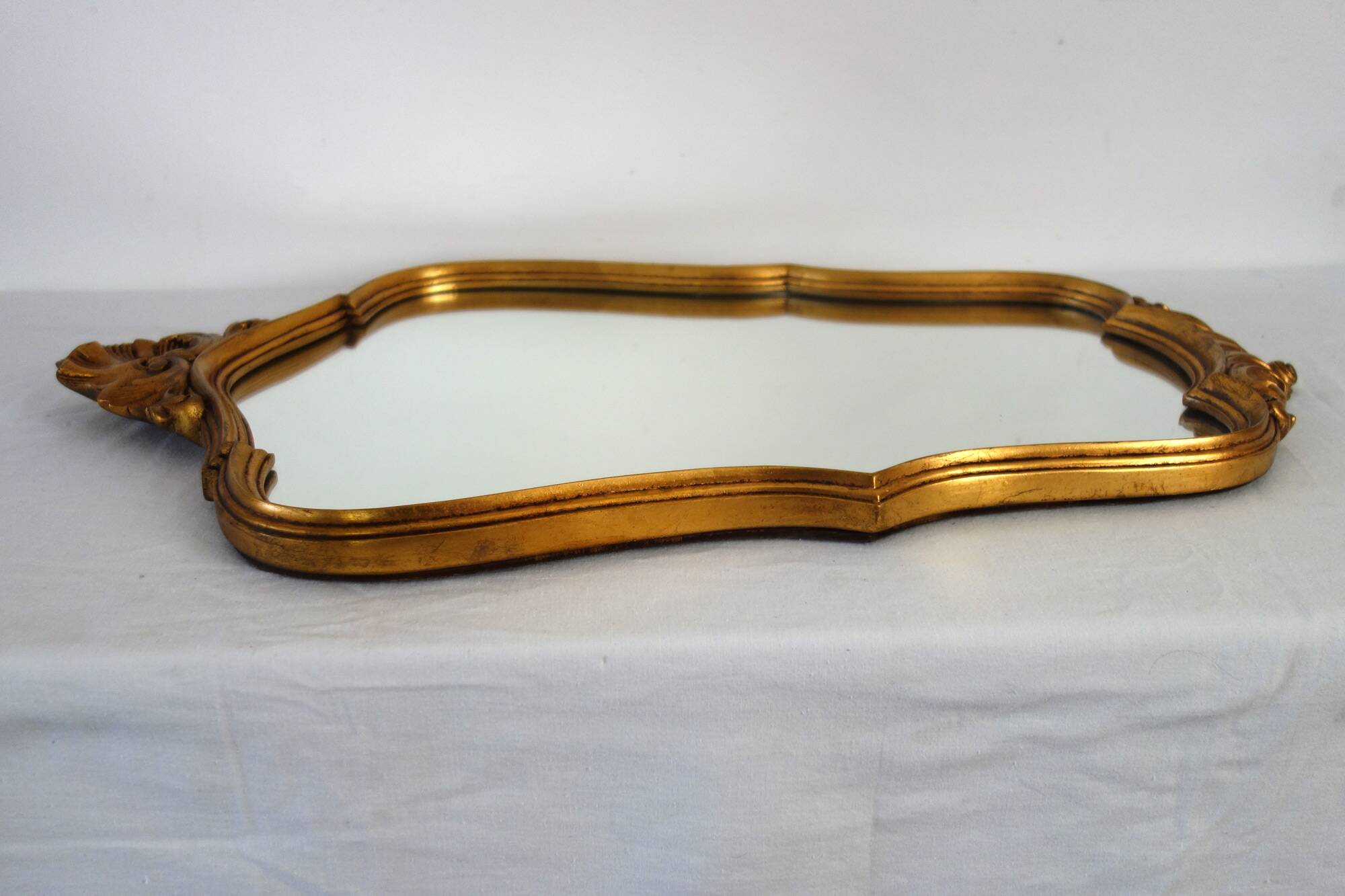 Vintage rocaille or shell gold mirror