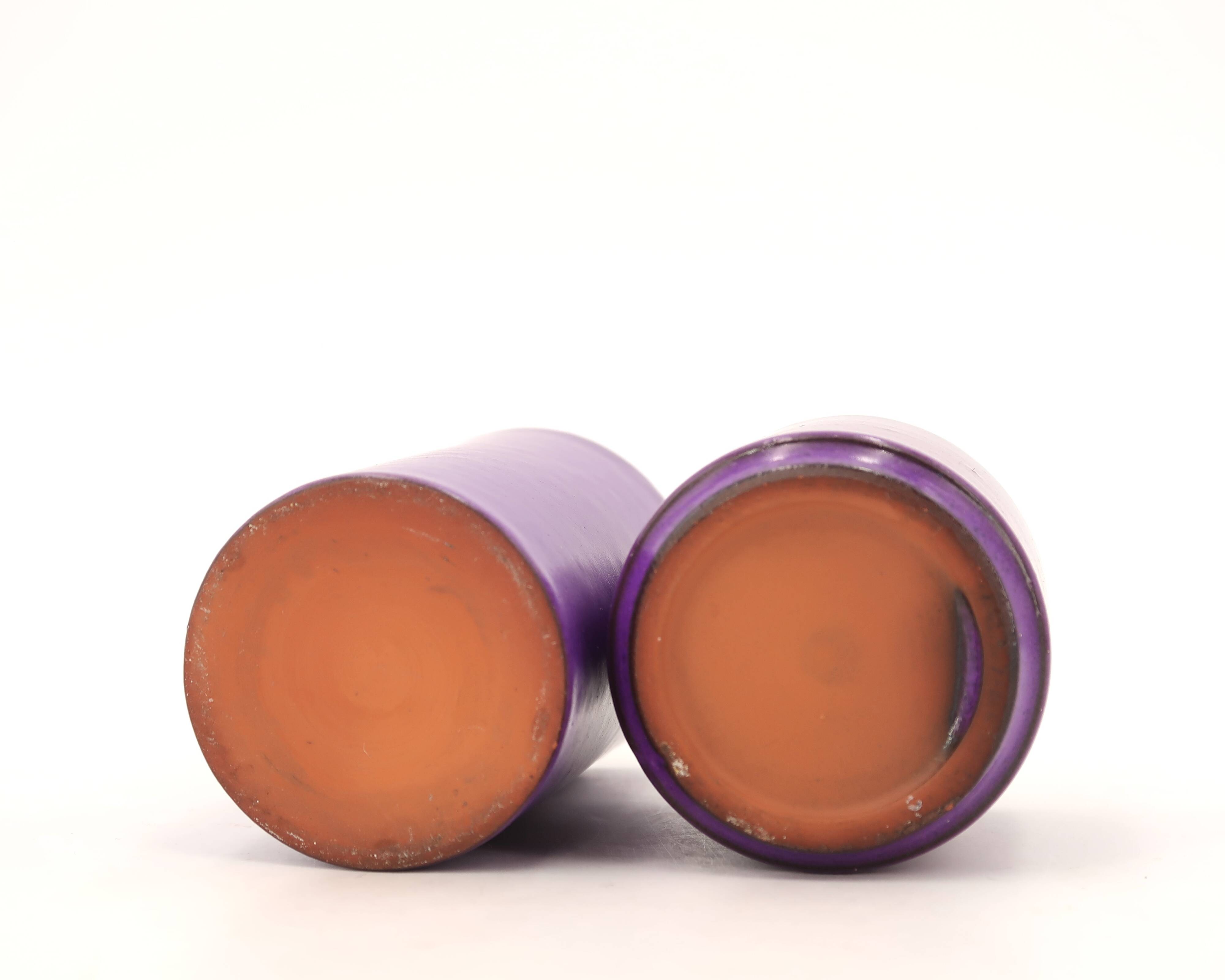 Two purple ceramic roller vases, 1970s