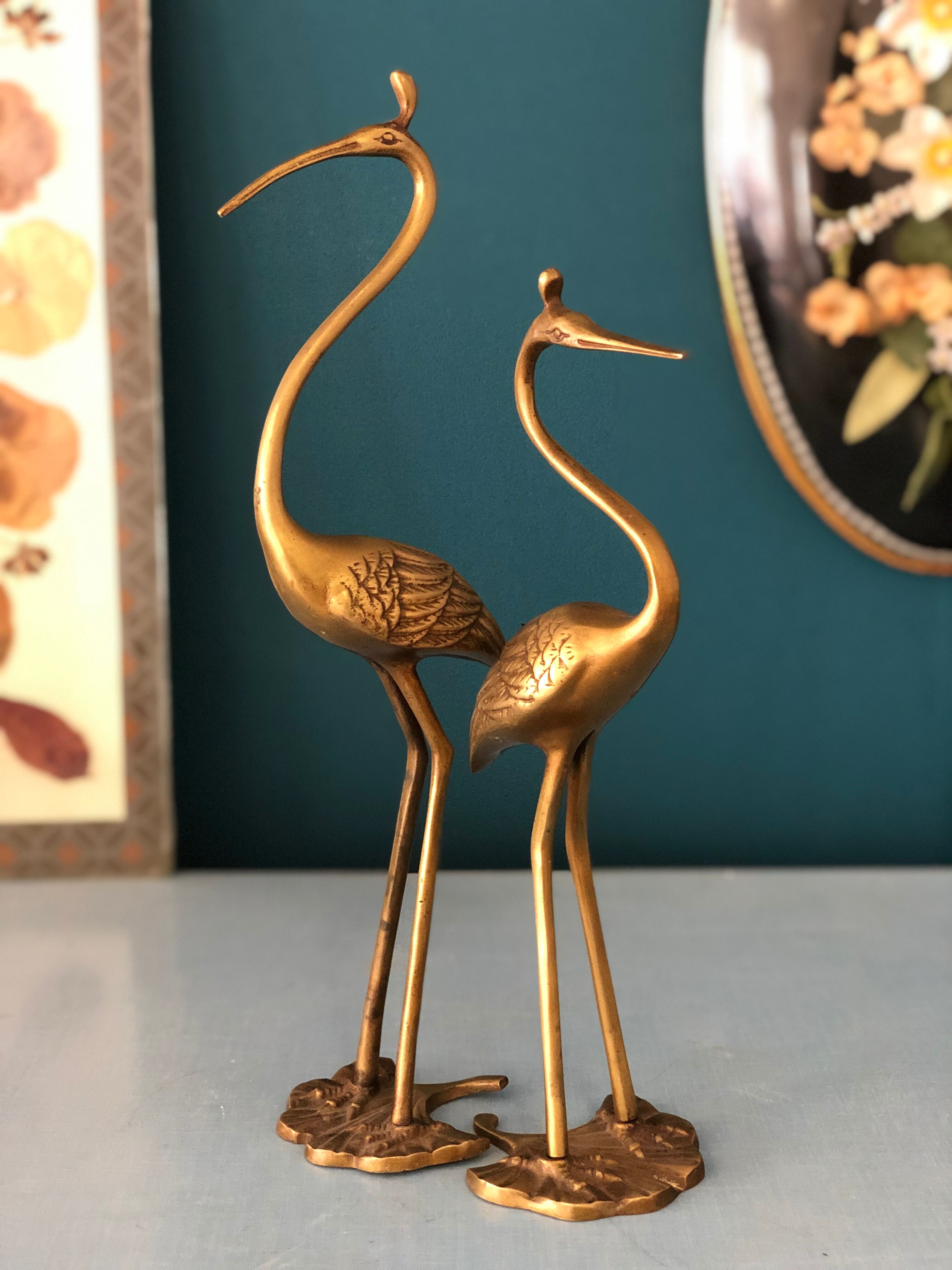 Couple of brass herons