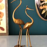 Couple of brass herons