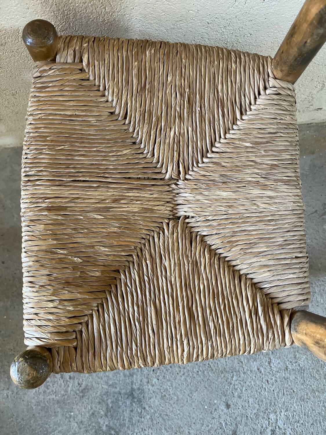 Old turned and stuffed wooden chair