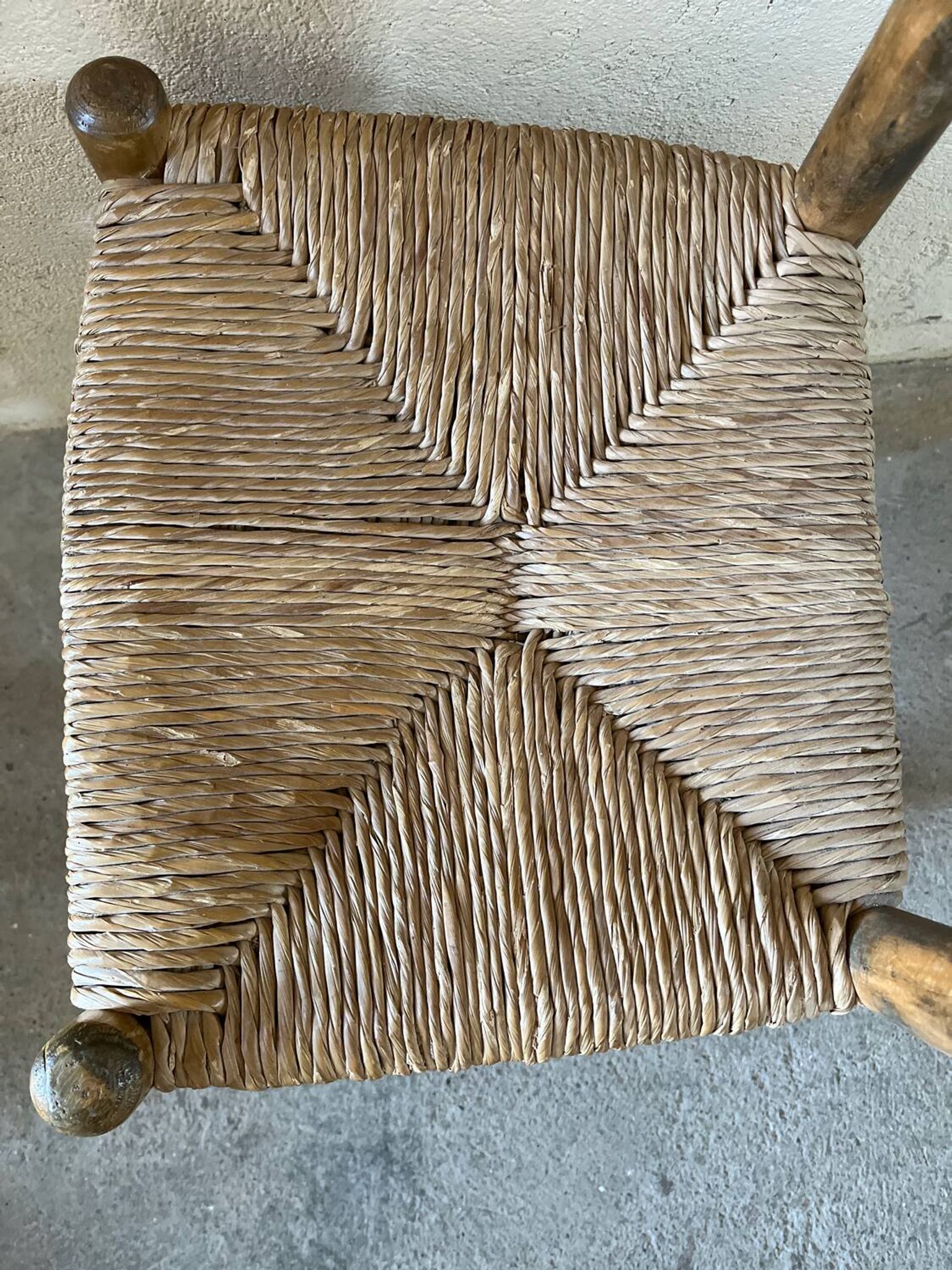 Old turned and stuffed wooden chair