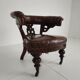 Antique leather armchair by Robson & Son – carved wood & castors, Newcastle