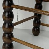 Brutalist wood turned bobbin rush stool in the style of Charles Dudouyt