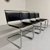 Lot of 4 tubular chairs designed by Mart Stam in vintage black leather from the 1980s.