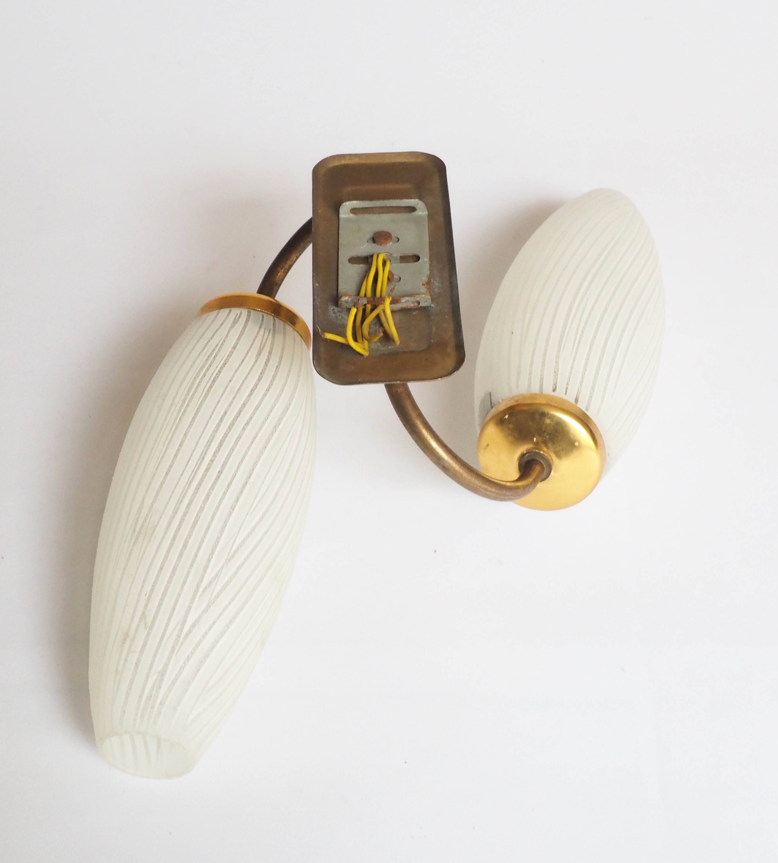 Double flute and brass wall light