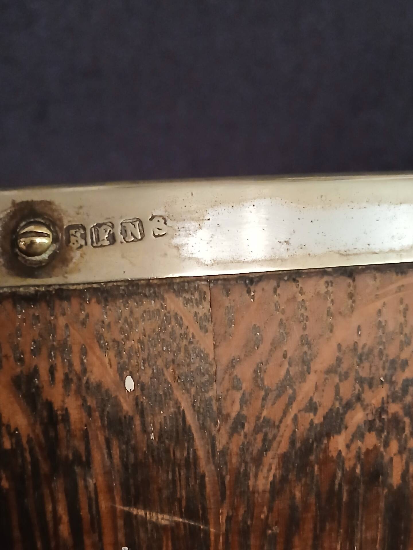 Victorian era silver-plated bowl with oak wood.