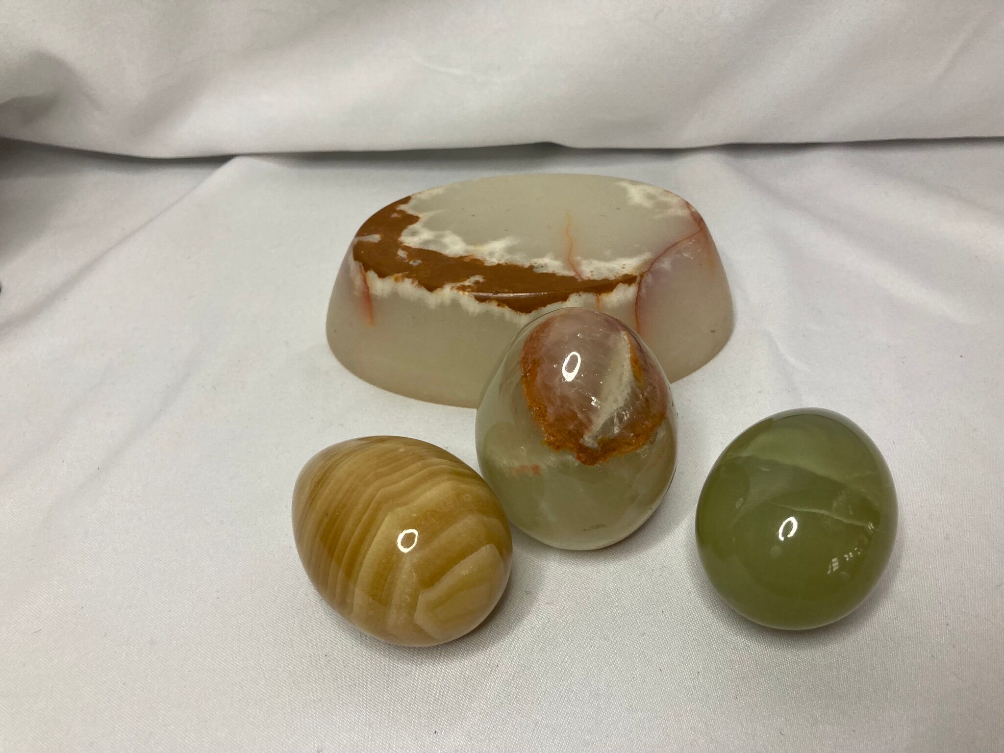 Series of three onyx eggs and XXth cup