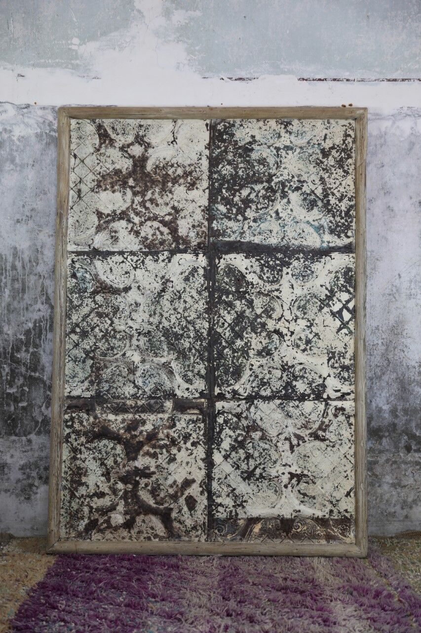 Decorative panel with patinated metal and wood