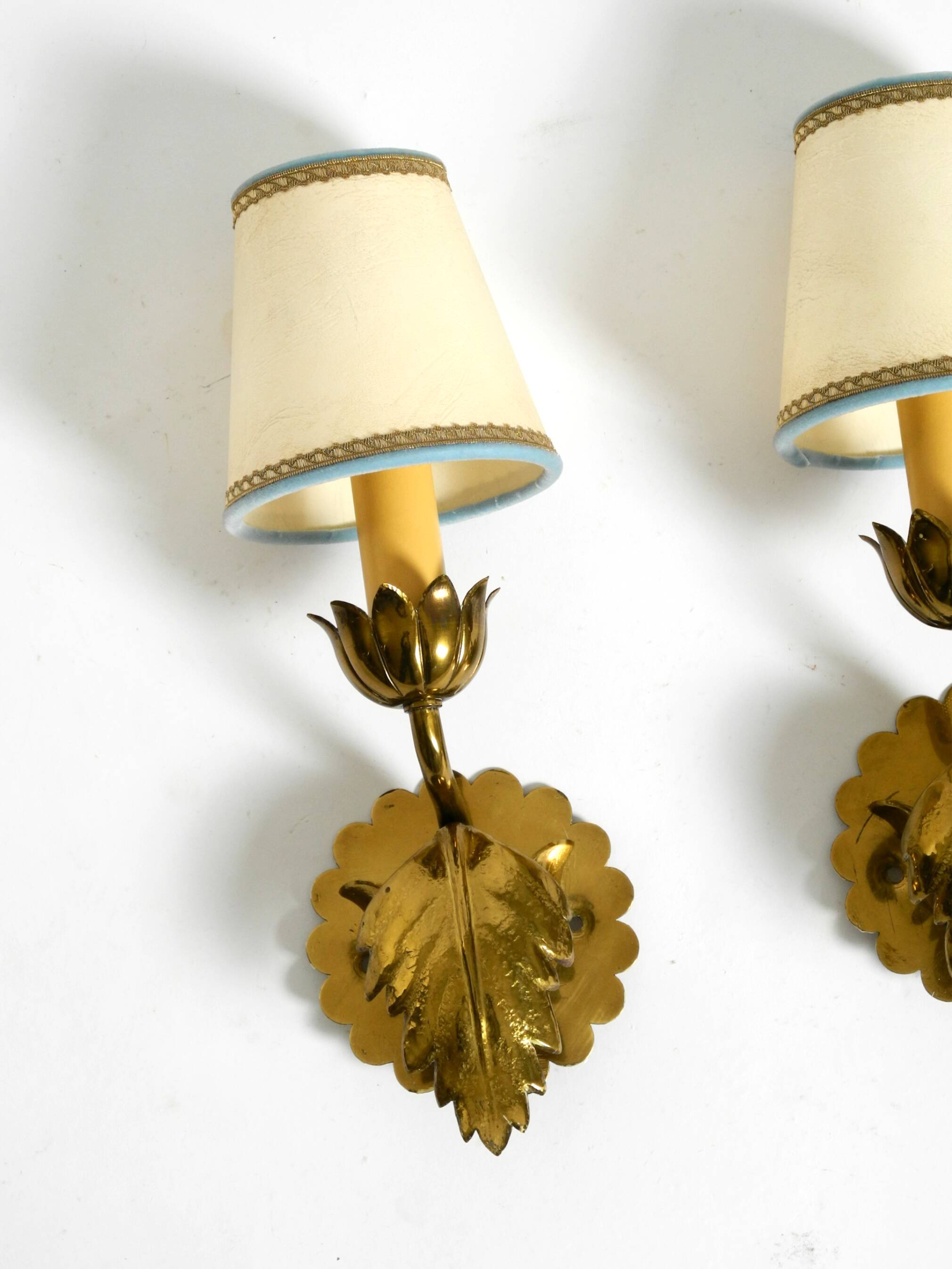 Two beautiful original Mid Century Modern floral wall lamps made of brass w