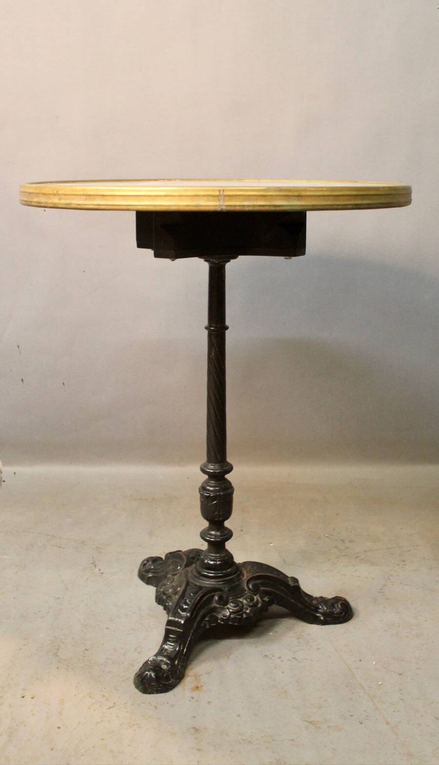 Bistro table with cast iron base