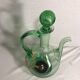 Old refreshing carafe pourer in green blown glass with vintage cap