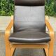 Fauteuil à bascule scandinave bois courbé et cuir marron ikea poang