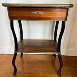 Old wooden seamstress