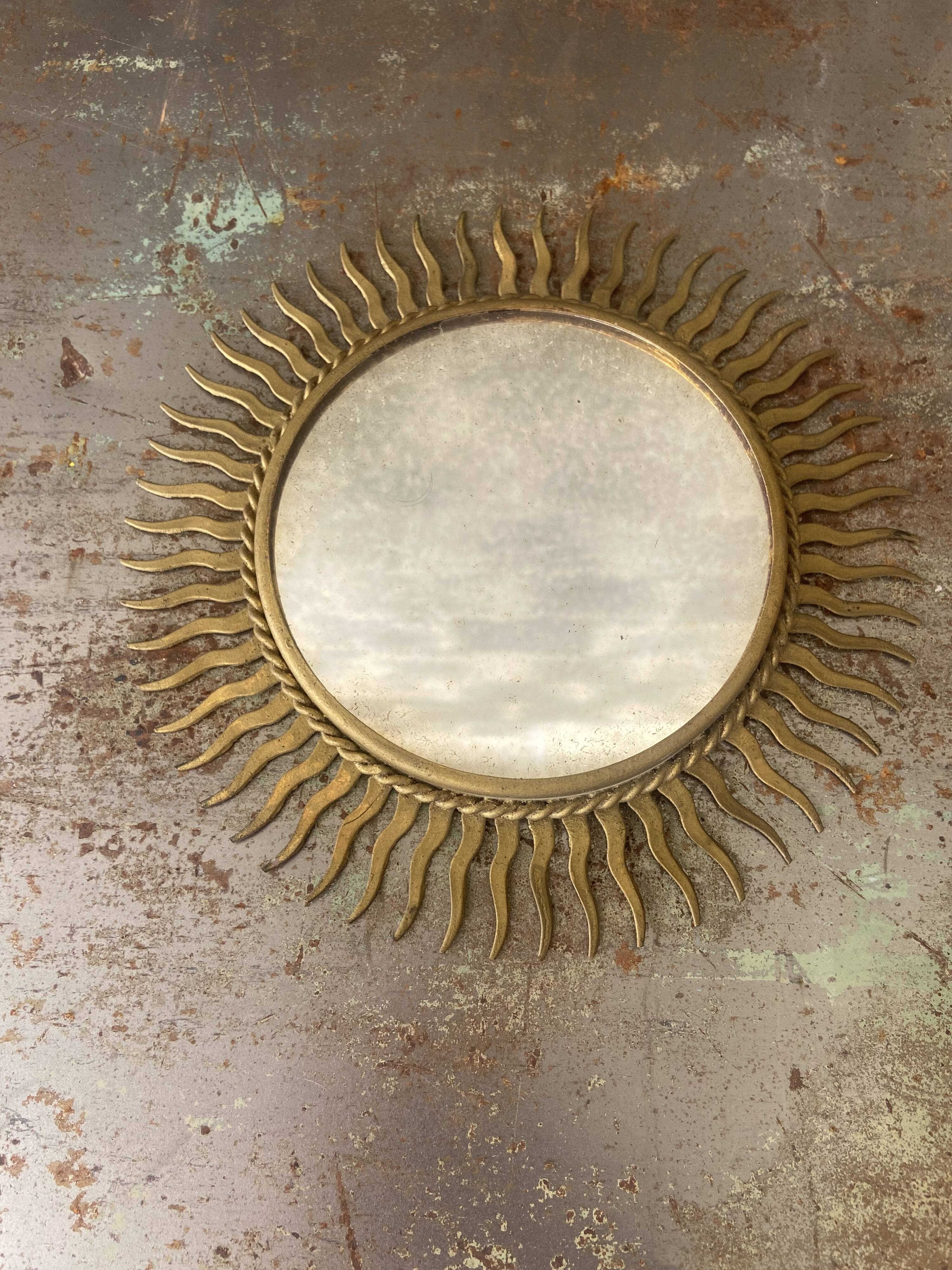 Vintage gold metal sun mirror