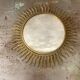 Vintage gold metal sun mirror