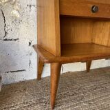 Bedside table with compass feet