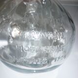 Bottle with handle and mechanical cap
