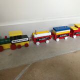 Small vintage train in multicolored wood