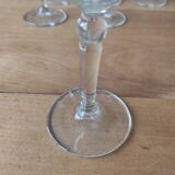Set of 6 glasses with gold band decorations.