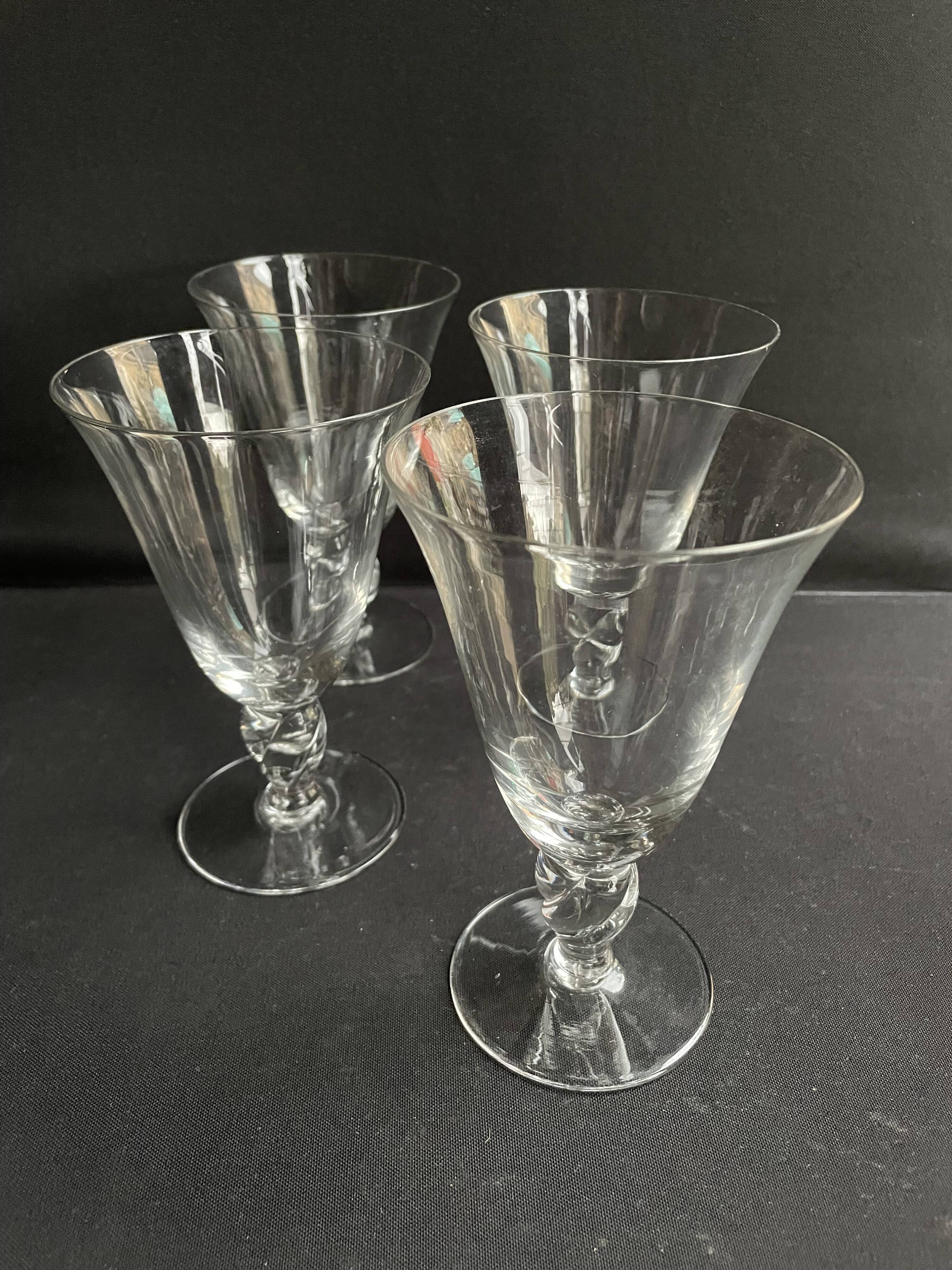 4 large conical glasses