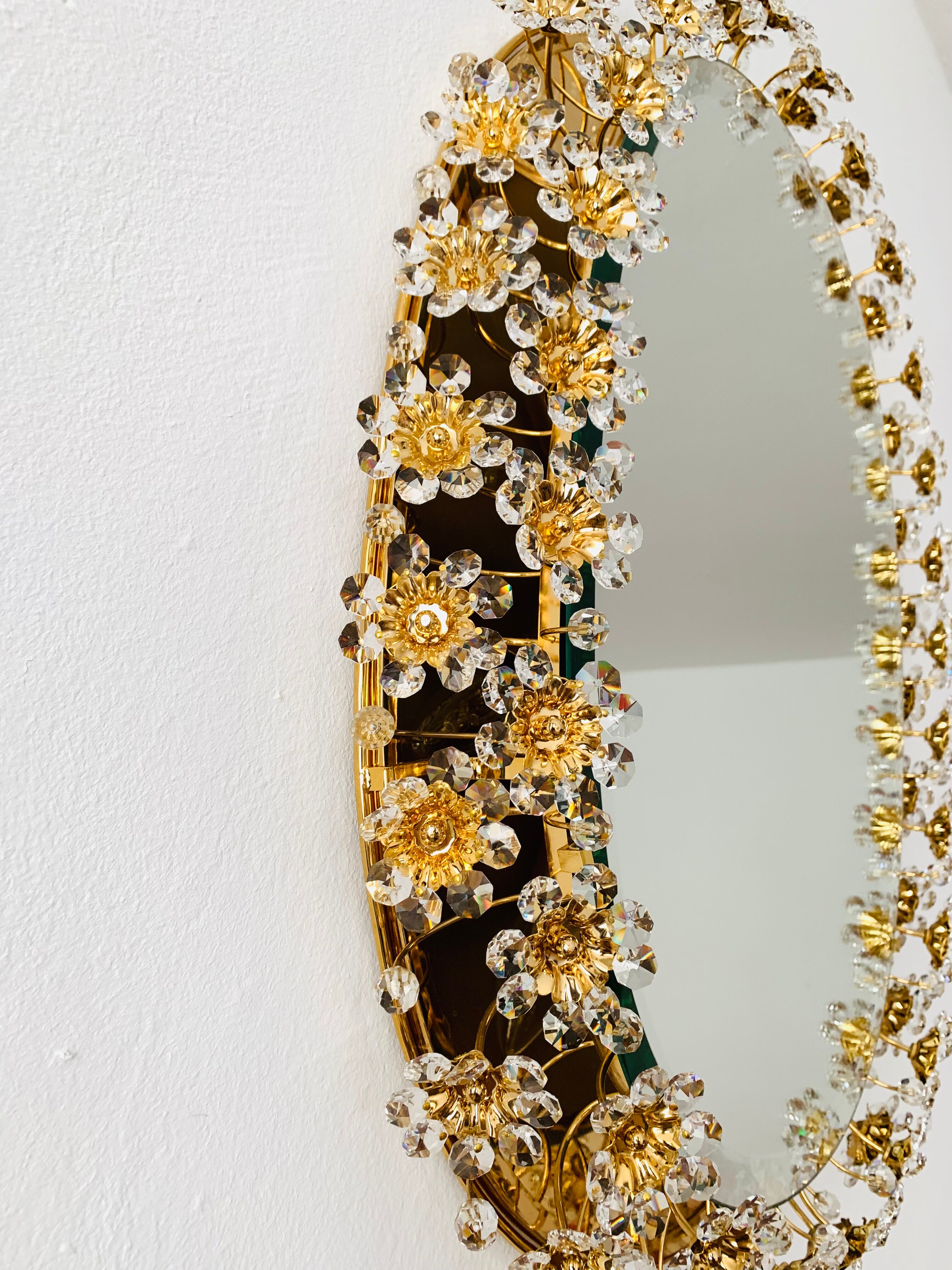 Illuminated floral mirror by Palwa