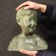 Sculpture in bronze painted terracotta bust of a child