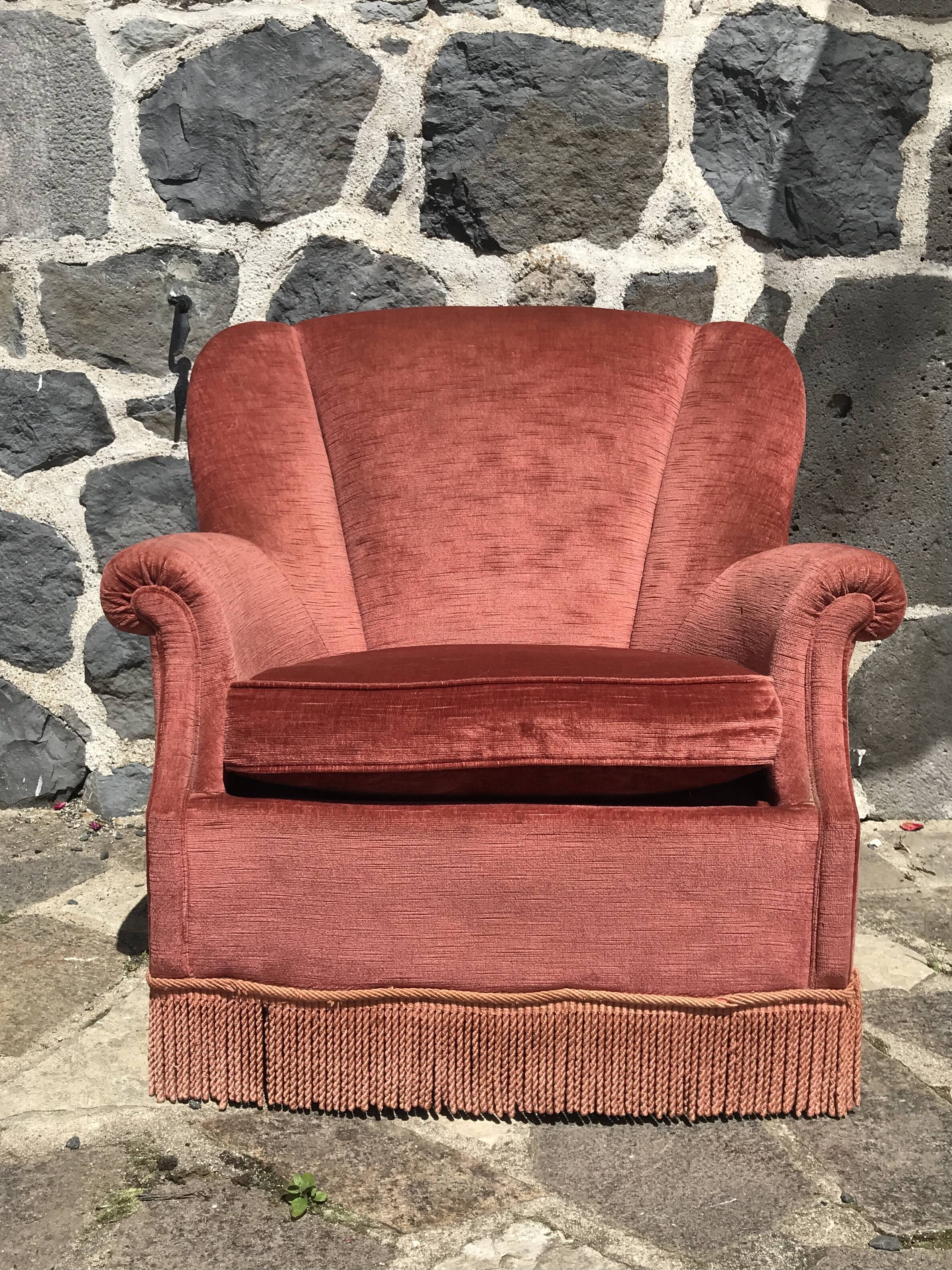 Vintage pink velvet armchair with fringes