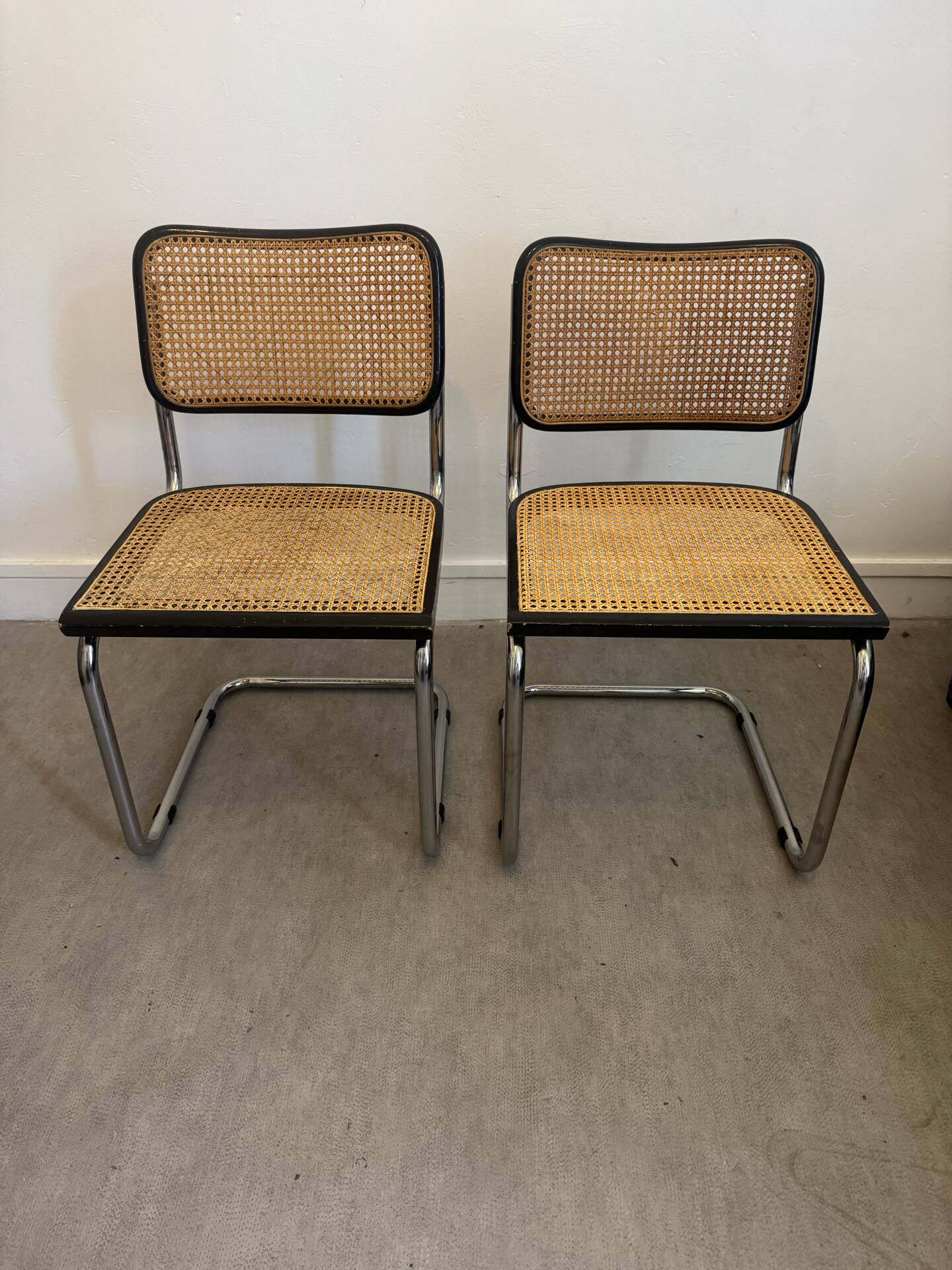 Pair of black Cesca chairs by Marcel Breuer