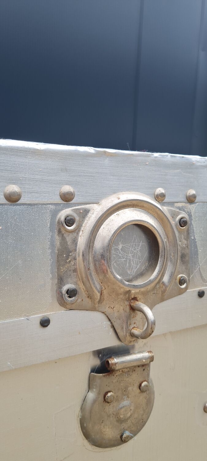 Riveted metal transport trunk