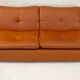 Imitation leather sofa "caramel". Convertible. France, circa 1990
