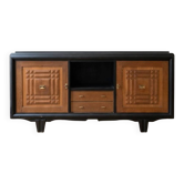 Buffet in Art Deco style made of blackened wood and carved oak.