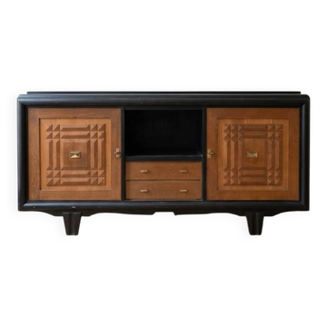 Buffet in Art Deco style made of blackened wood and carved oak.