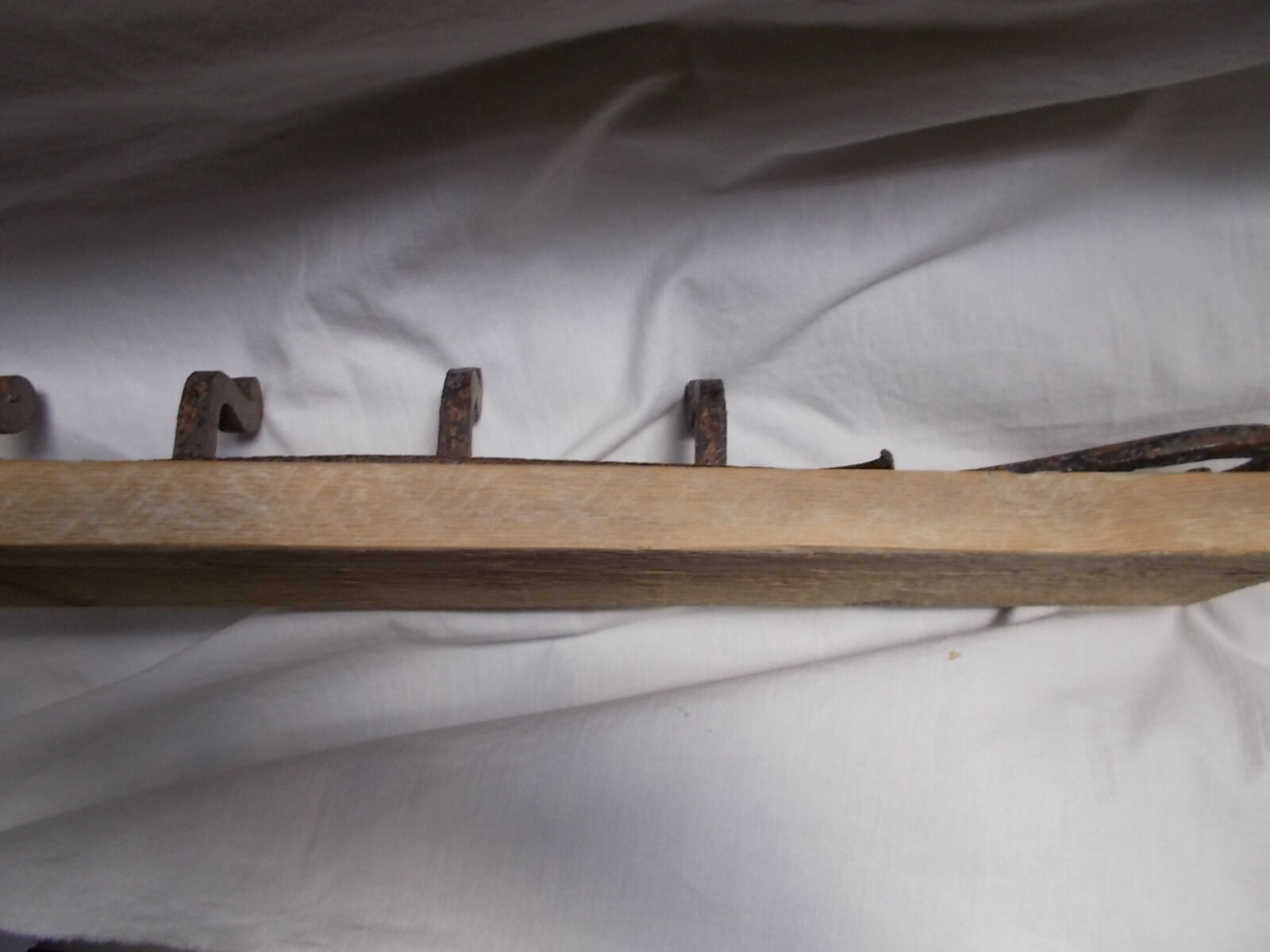 Wrought iron and wooden rack