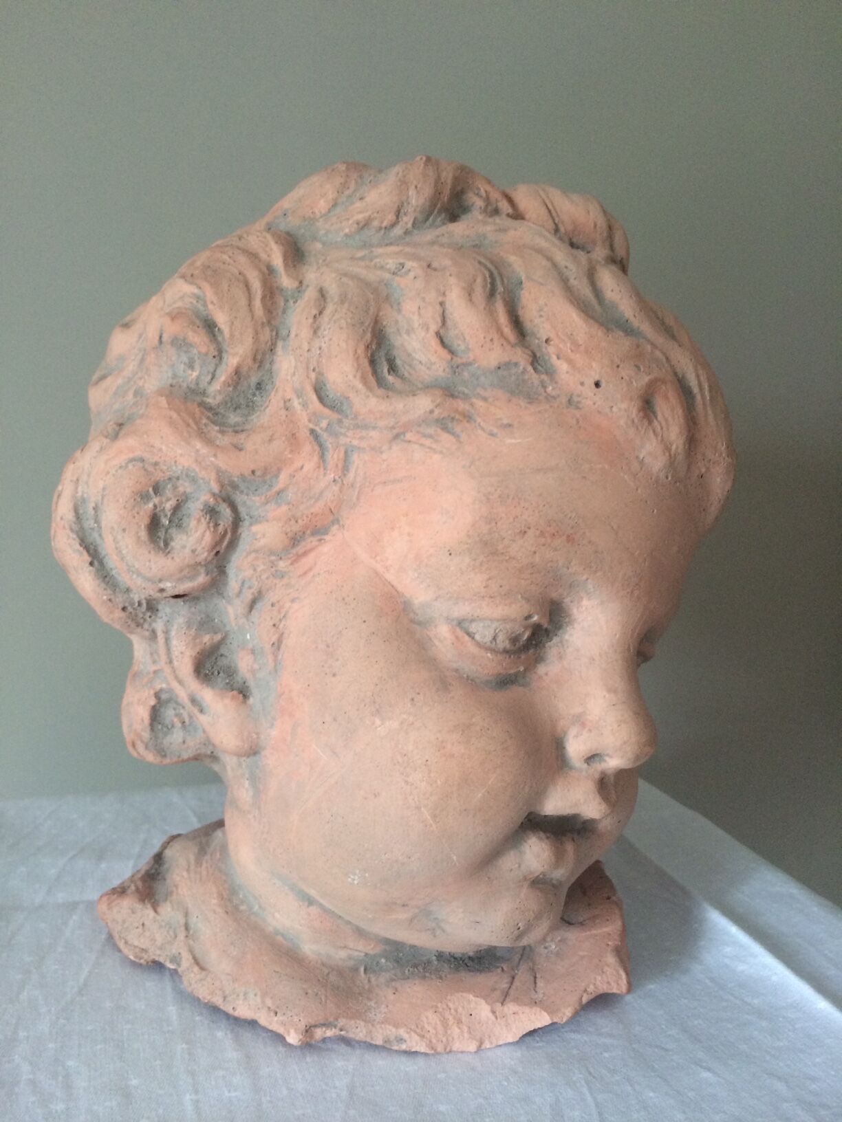 Child bust in plaster