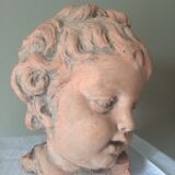 Child bust in plaster