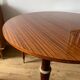 Round mahogany table with extension