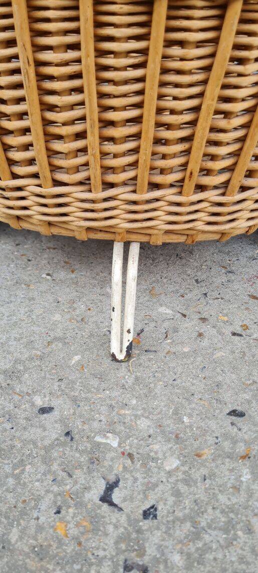 Vintage wicker log basket on vintage wheels