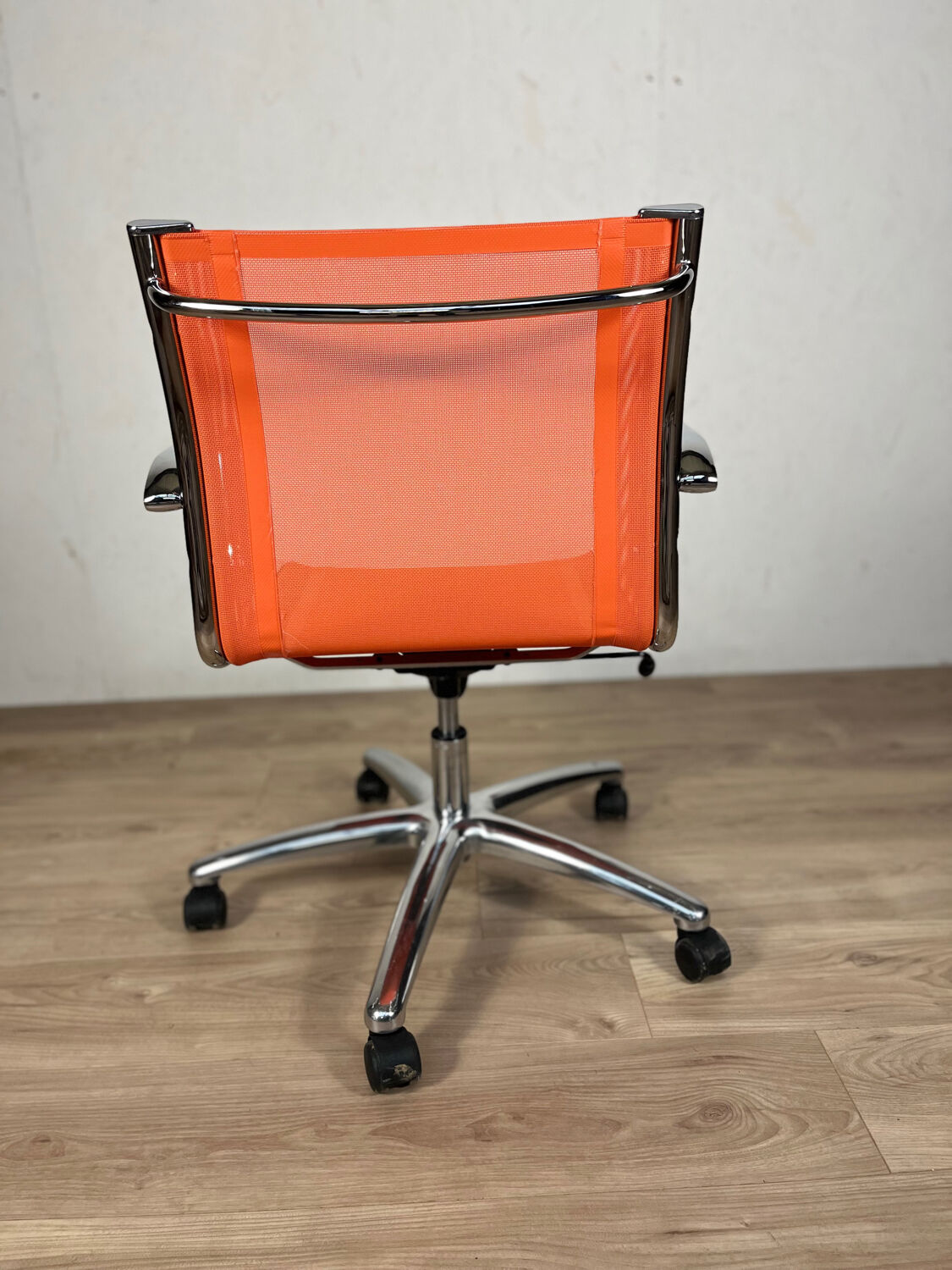 Designer office chair - Orange mesh and chrome base