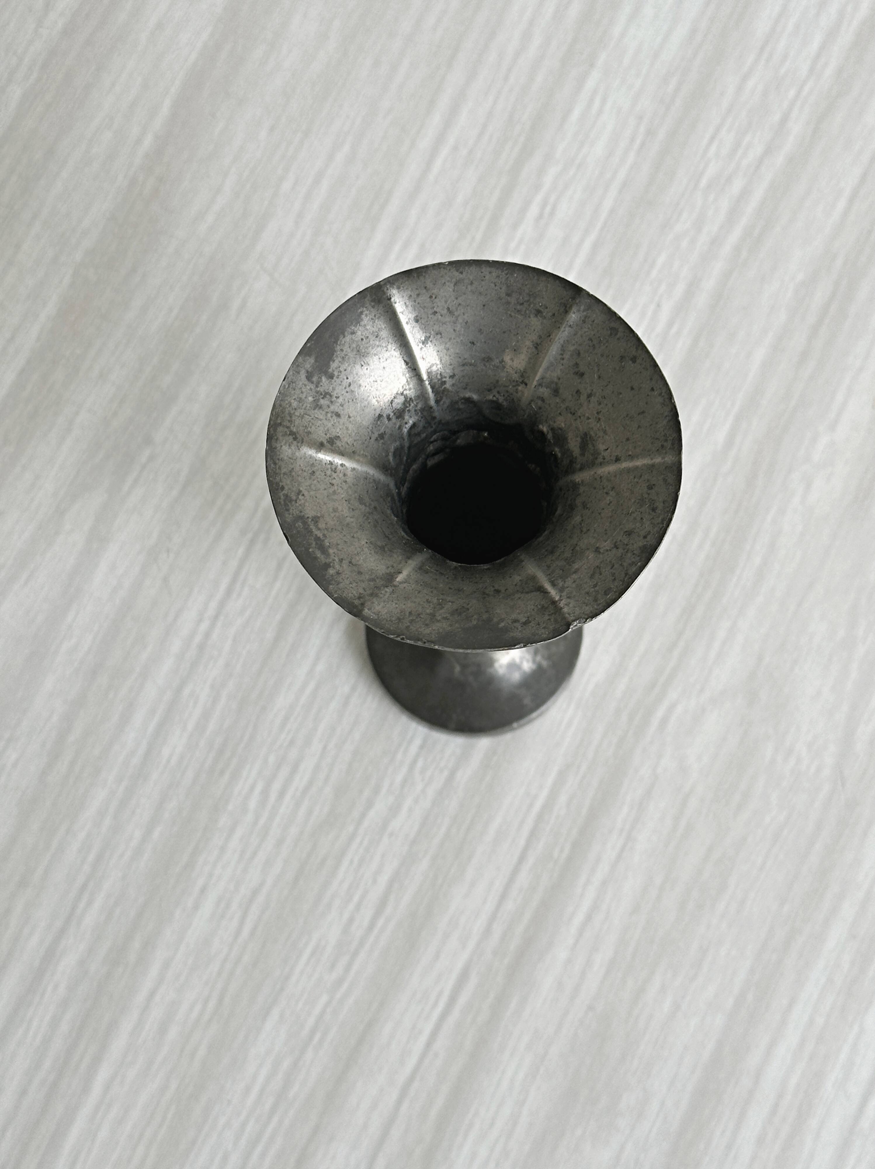 Patinated metal vase