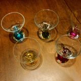5 small glasses with colored bubble inclusions