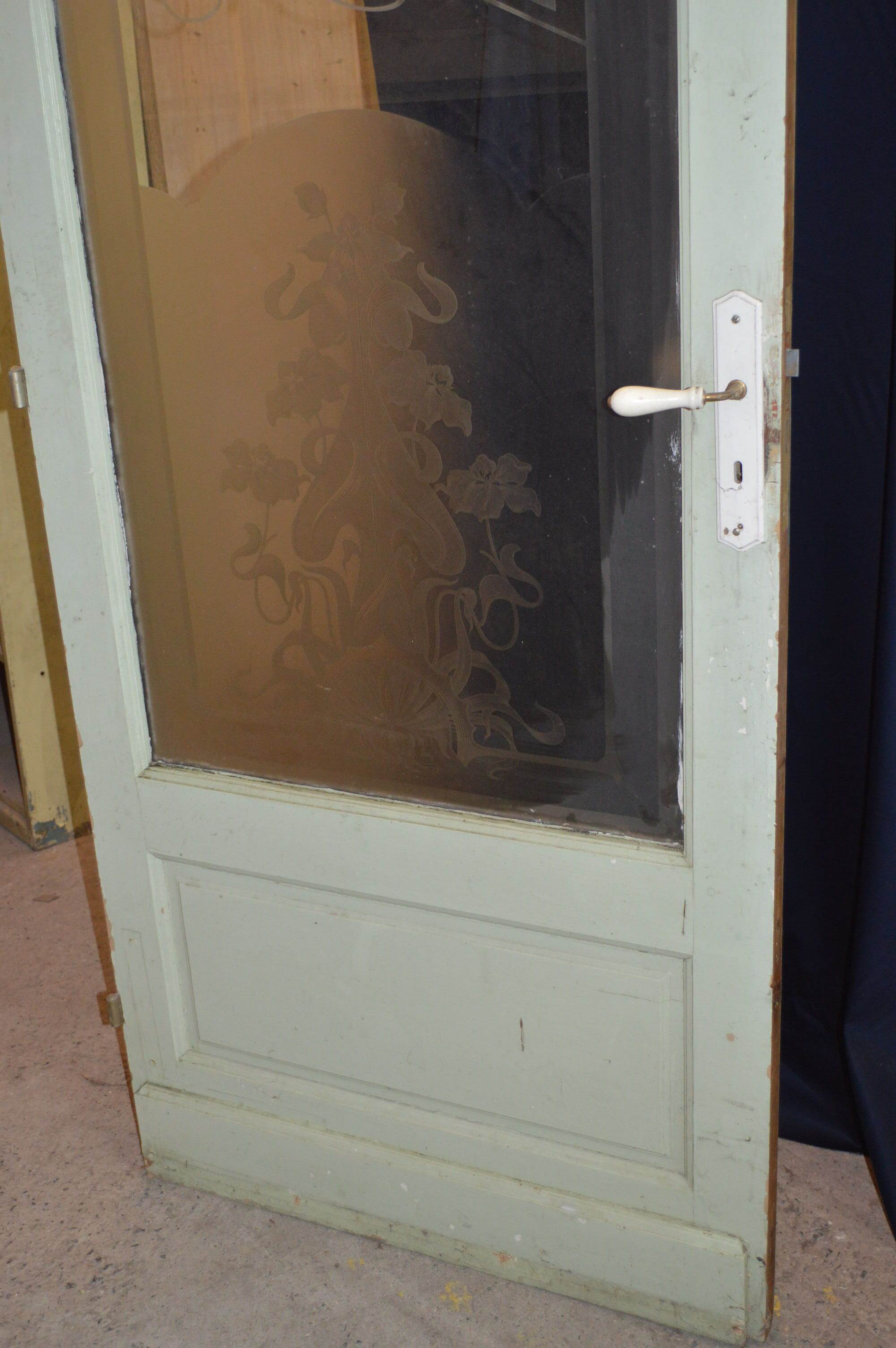 Porte avec un verre gravé "droguerie"