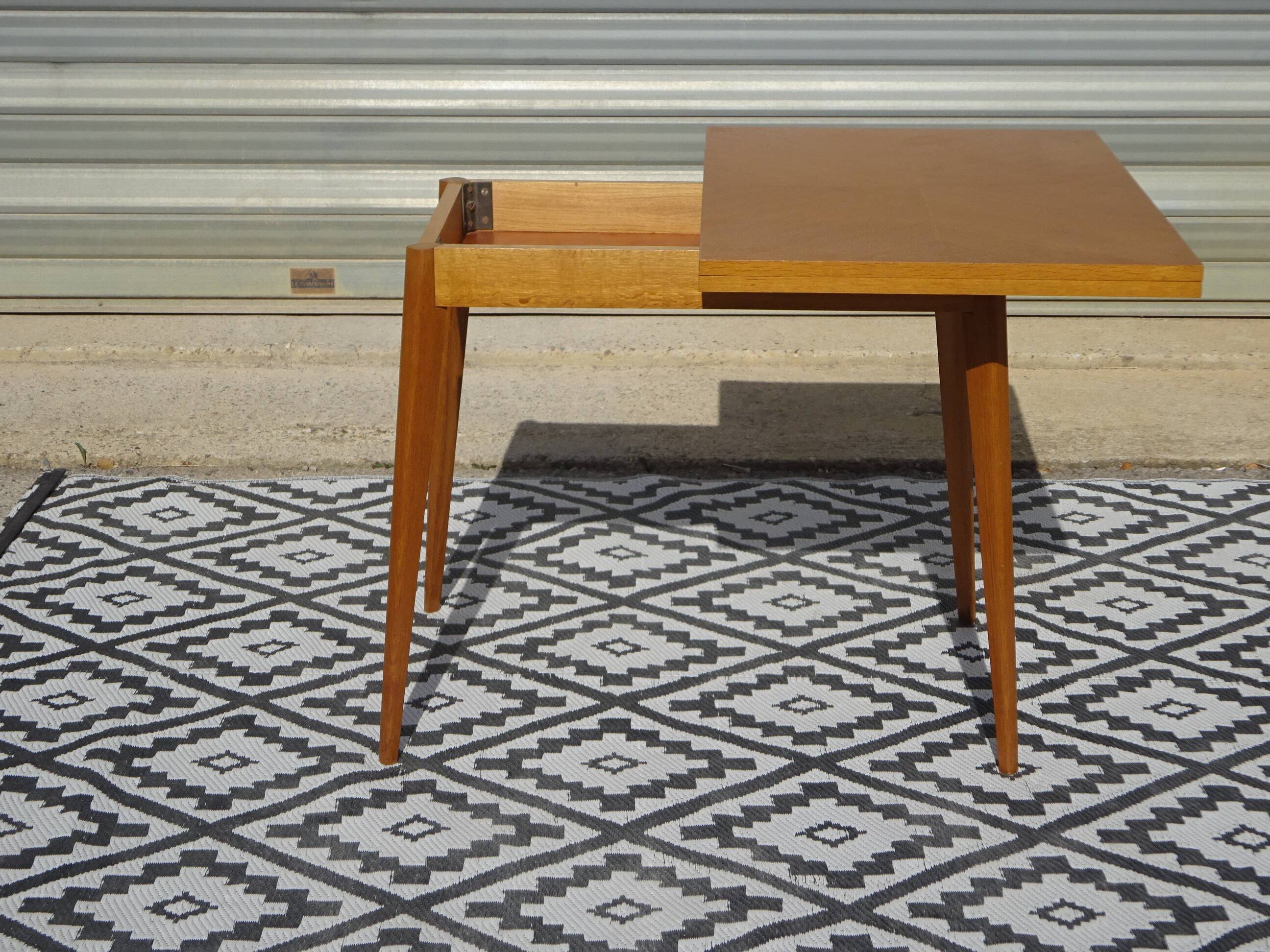 Scandinavian portfolio table model "half-century" by SAM