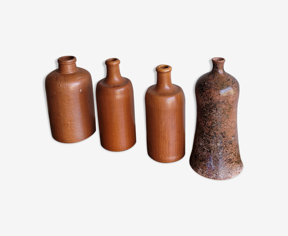Lot de 4 bouteilles en céramiques et grès