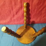 Wooden milking stool with twisted legs