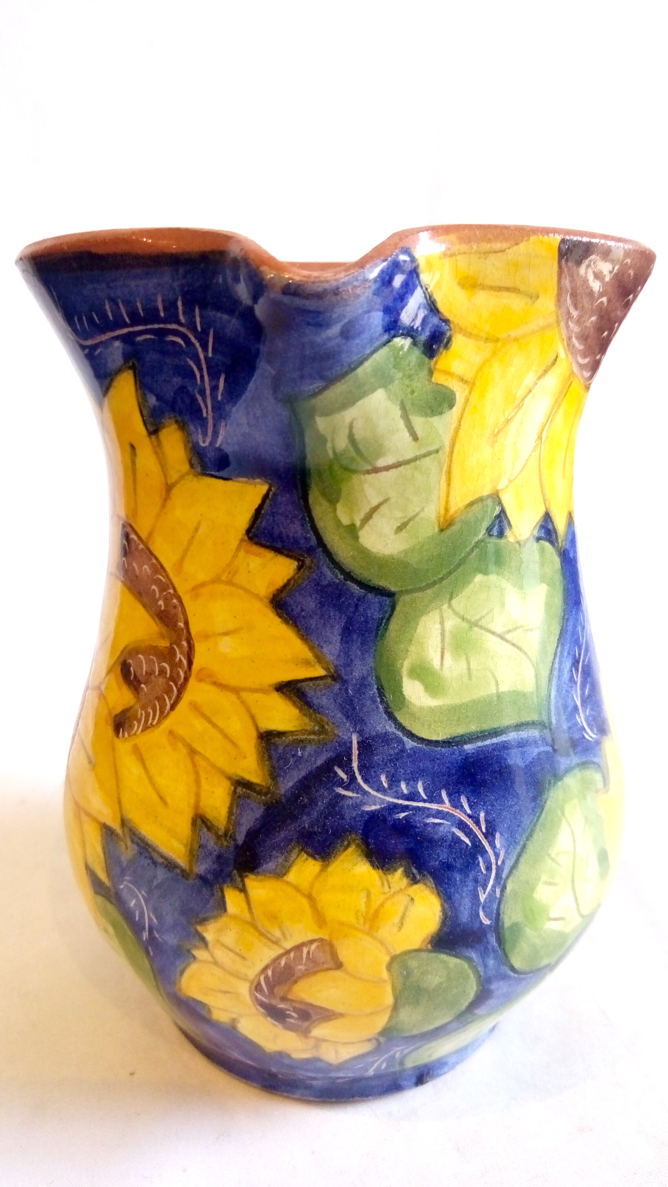 Portuguese pitcher with sunflowers